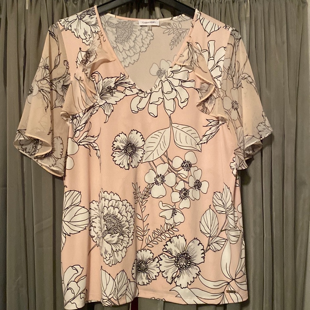 Calvin Klein very light pink/peach with black and white design